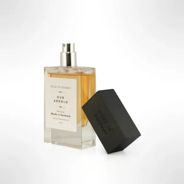 Patchouli Allure Oud Absolu perfume bottle with its cap off