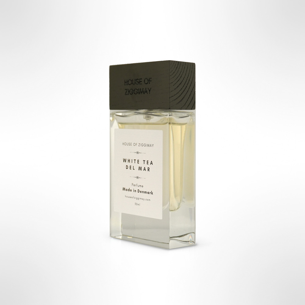 White Tea Del Mar perfume bottle turned a little, cap on