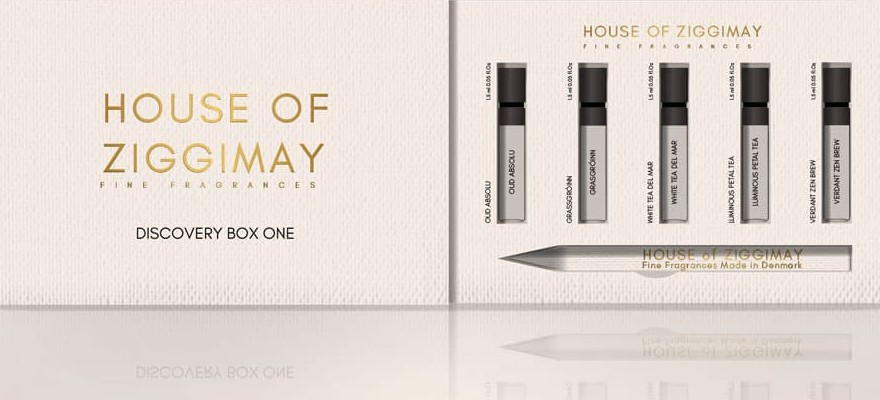 The Discovery Box open, showing five 1.5 ml sample vials and a tester strip